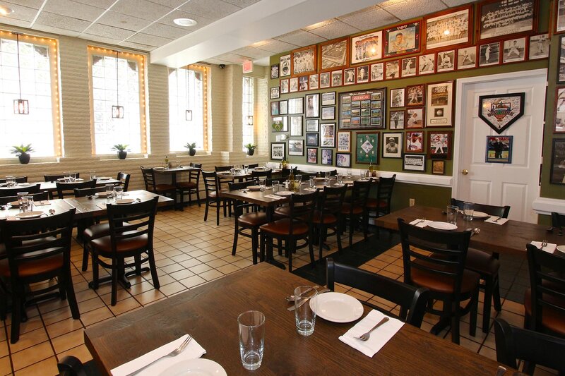 Side dining room with baseball memorabilia decorations